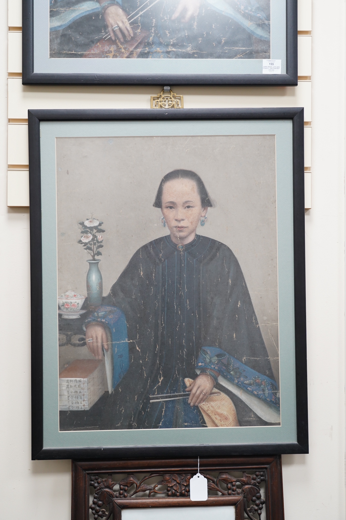 China Trade, late Qing dynasty, two portraits of Qing ladies, oil on canvas, each 63 x 47cm, later framed and glazed. Condition - poor to fair